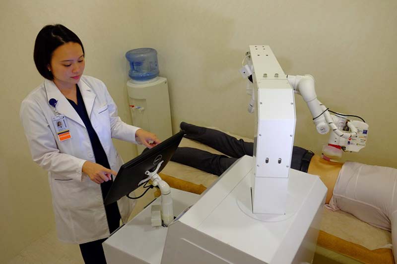 Robot masseuse developed by start up incubated at NTU Singapore starts operating at traditional Chinese medicine clinic